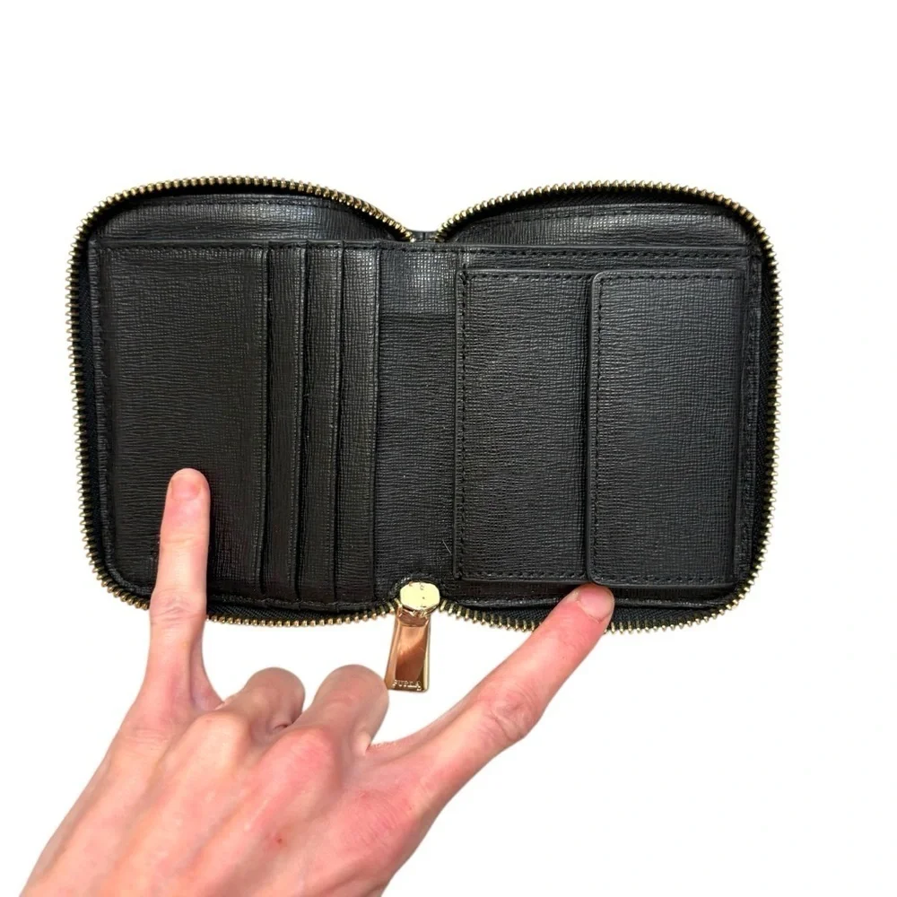 Furla black embossed leather zippy wallet